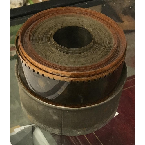 277 - Qty of vintage 9mm films in original tins. Some say comedy and 1 says 