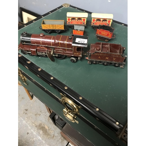 72 - Vintage clockwork 'O' gauge tin plate engine & tender with some carriages and track