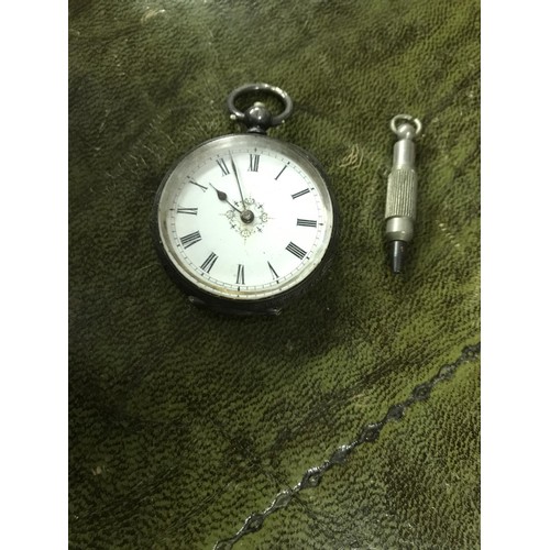 7 - Pocket watch with key