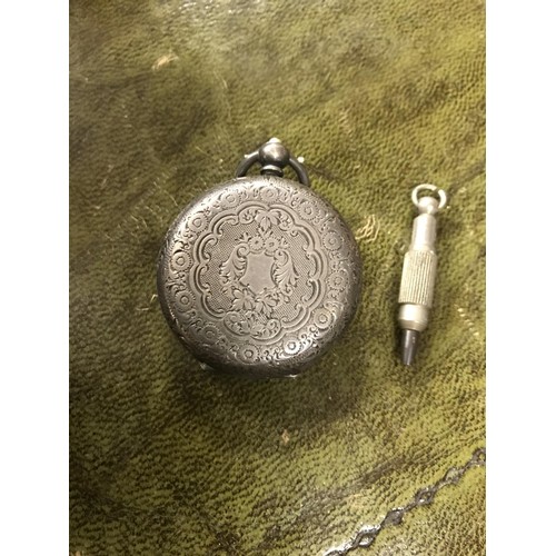 7 - Pocket watch with key