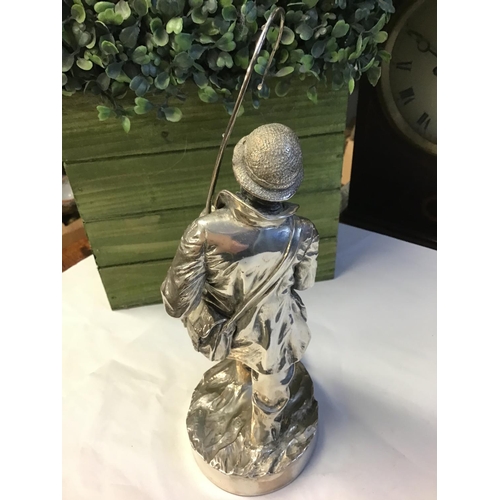 391 - Silver hallmarked Fisherman - Signed - 10 inches to top of fishing rod