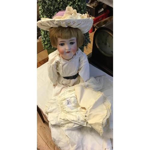 396 - Large vintage doll with jointed limbs and rocking eyes - Damage to neck and chest/back