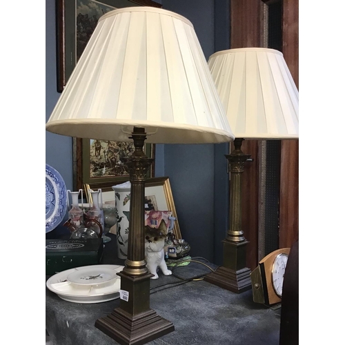 400 - Pair of metal Corinthian column lamps and shades