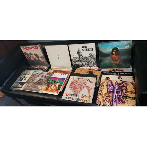 343 - Box of LPs Approx 65 inc Beatles etc and case of singles Approx 44 - COLLECTION ONLY