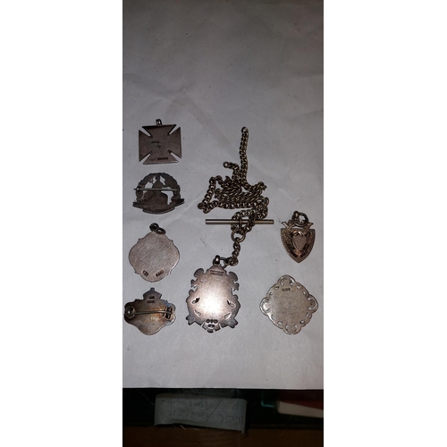 575 - Box of silver pin badges and madallions - some military