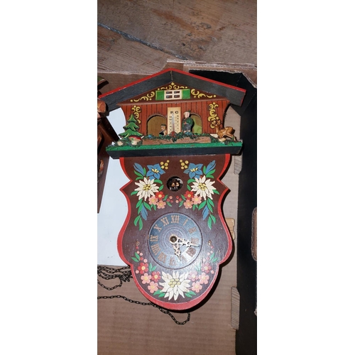 597 - 2 x Cuckoo clocks a Anniversary clock A/ F - CLOCKS AND WATCHES ARE NOT TESTED