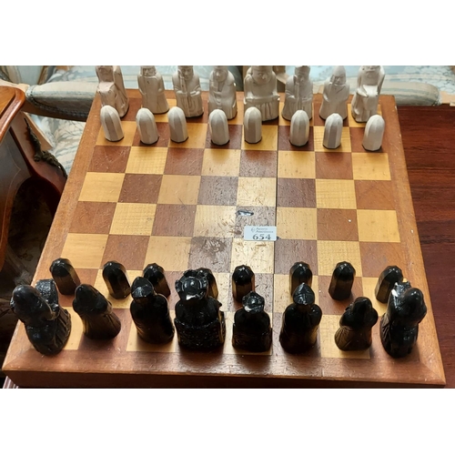 654 - Chess set with spare pieces