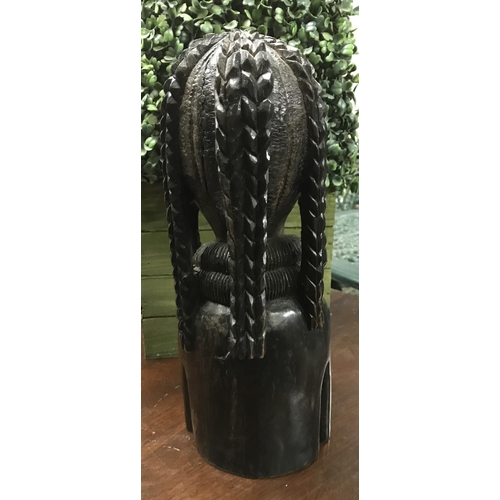 590 - Carved tribal figure