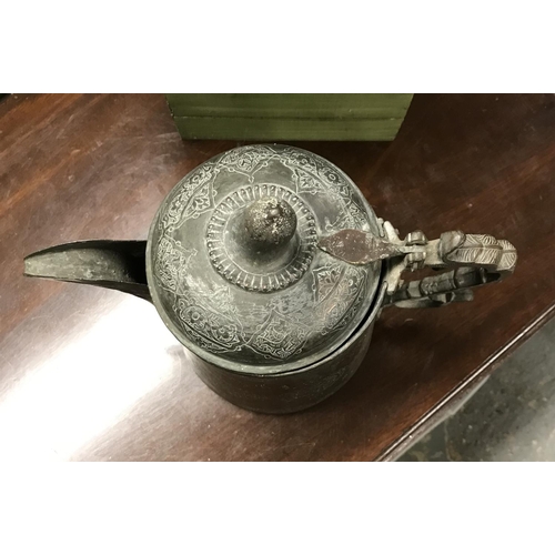 596 - Decorative metal Eastern pot