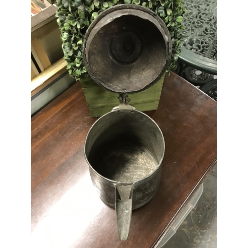 596 - Decorative metal Eastern pot