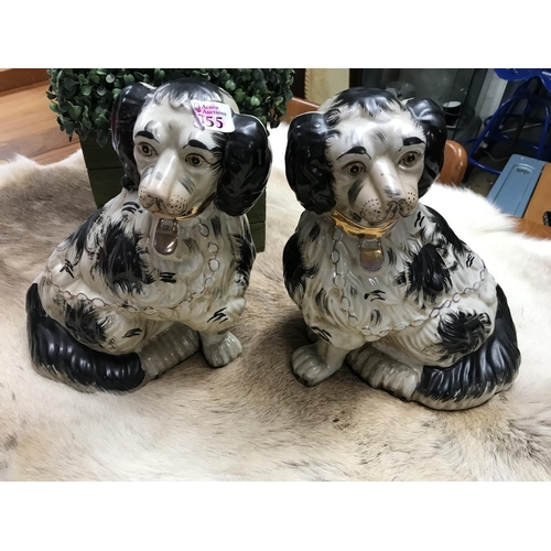 755 - Pair of large Staffordshire fire dogs