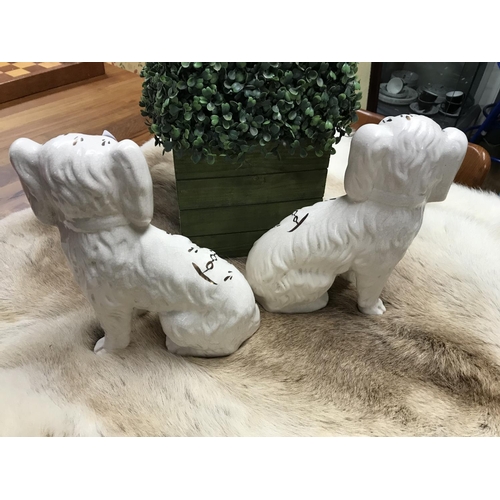 761 - Pair of Staffordshire fire dogs