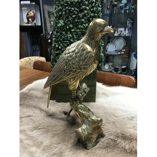 820 - Very large lovely brass eagle on a branch - approx 16 inches in height