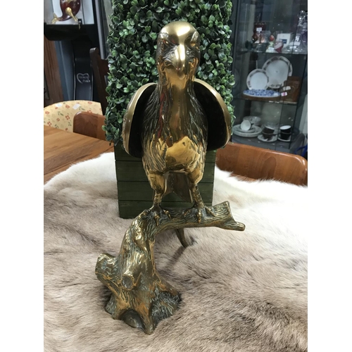 820 - Very large lovely brass eagle on a branch - approx 16 inches in height