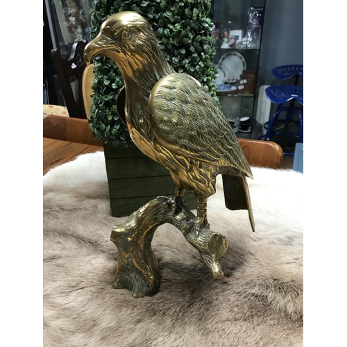 820 - Very large lovely brass eagle on a branch - approx 16 inches in height