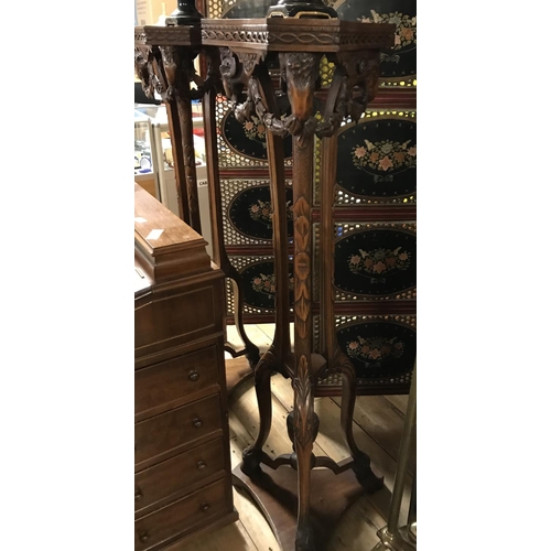 842 - Stunning pair of early tall decorative plant stands. Decorated with Rams heads and hoofed feet. Appr... 