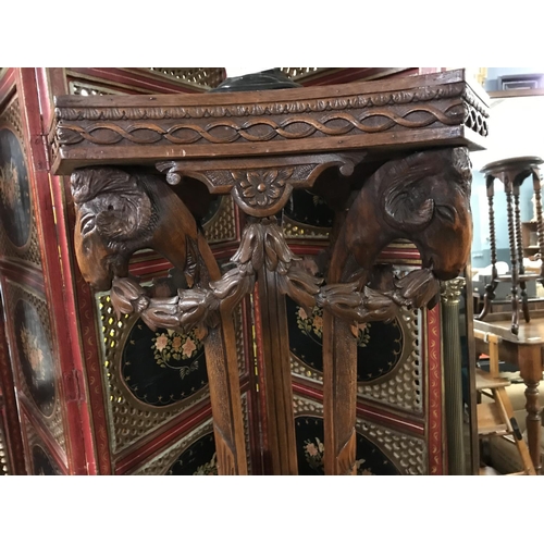 842 - Stunning pair of early tall decorative plant stands. Decorated with Rams heads and hoofed feet. Appr... 