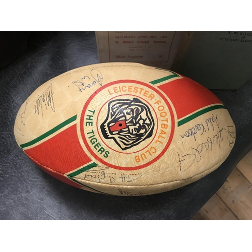 924 - Signed Leicester Tigers rugby ball with book and programme