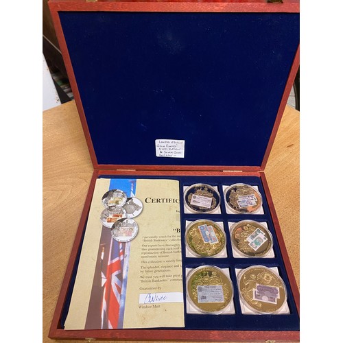 202 - Cased set of Ltd Edition gold plated notes design coins