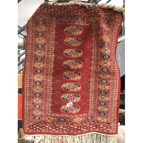 284 - Patterned silk rug measures 2ft x 3ft