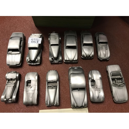 63 - Collection of 12 x pewter Jaguar model cars by The Danbury Mint - Lovely collectors item