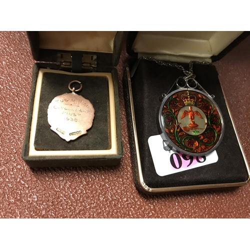 98 - Boxed Commemorative coin necklace and 9ct 1938 London Transport Tug Of War medal