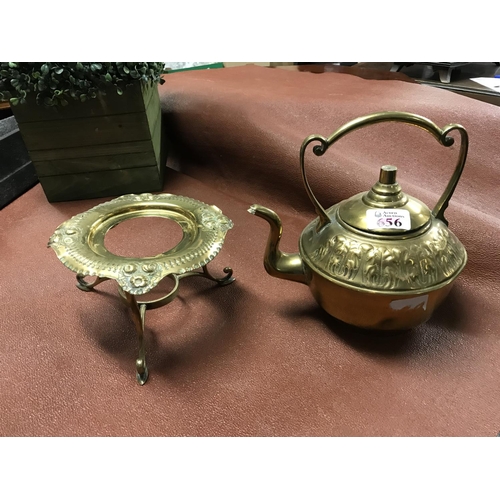 656 - Stunning ornate brass kettle on trivet