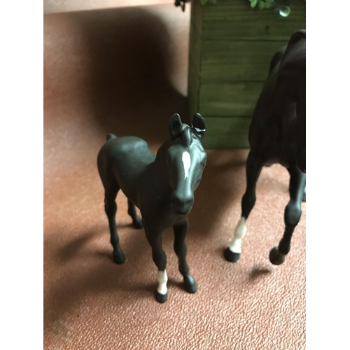 73 - Beswick black horse & foal (Foal has A/F to ear)