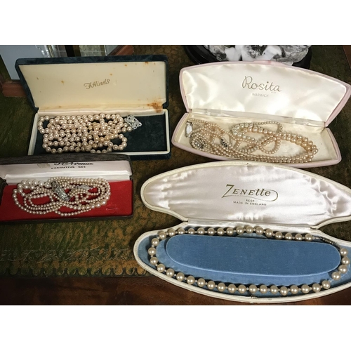 879A - Box of assorted vintage pearl necklaces