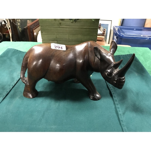 294 - WELL CARVED WOODEN RHINO W 11