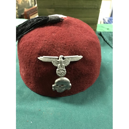 442 - WW11 MILITARY FEZ WITH BADGES