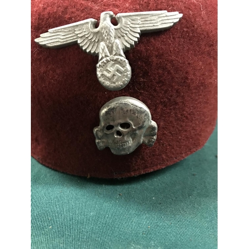 442 - WW11 MILITARY FEZ WITH BADGES