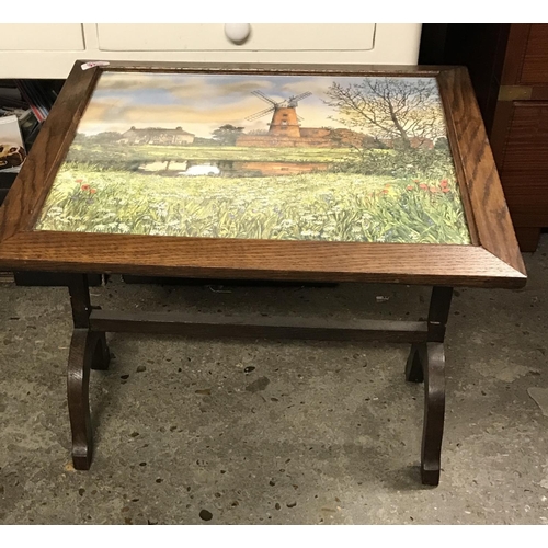 362 - Lovely vintage fire screen which folds into a table. Nice Dutch scene to front