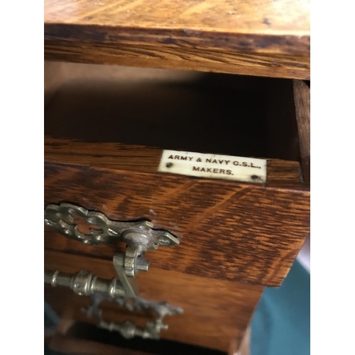 432 - Beautiful wooden 3 drawer cabinet with brass fittings. There is a name plaque 