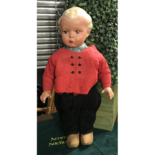 454 - Nice vintage Dutch boy doll. There is a wooden box which forms part of the dolls back, This doll pro...