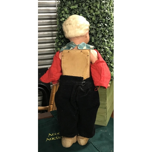 454 - Nice vintage Dutch boy doll. There is a wooden box which forms part of the dolls back, This doll pro...