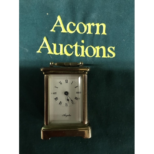 630 - Lovely miniature carriage clock - some damage to top surface - with key - CLOCKS AND WATCHES ARE NOT... 