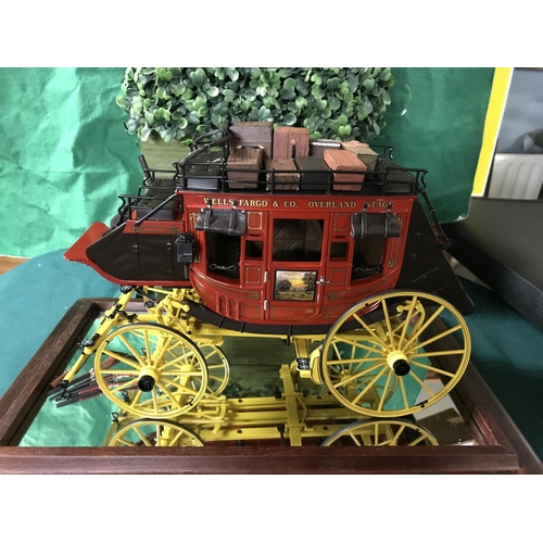 737 - Lovely cased scale model of Wells Fargo stage coach with luggage & guns - Case measures 14