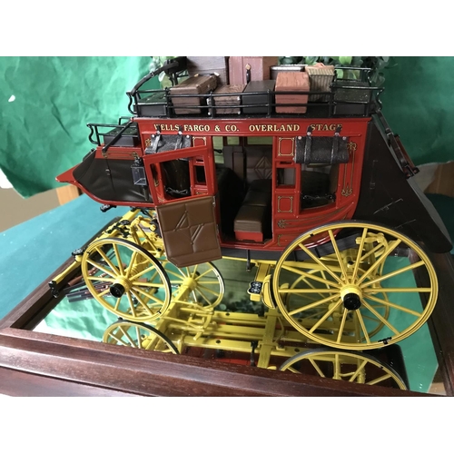 737 - Lovely cased scale model of Wells Fargo stage coach with luggage & guns - Case measures 14