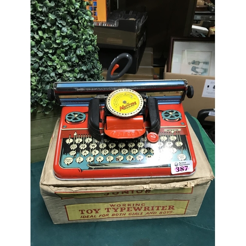 387 - BOXED METTYPE JUNIOR TIN TOY TYPEWRITER