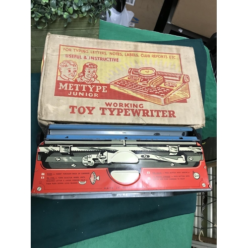 387 - BOXED METTYPE JUNIOR TIN TOY TYPEWRITER