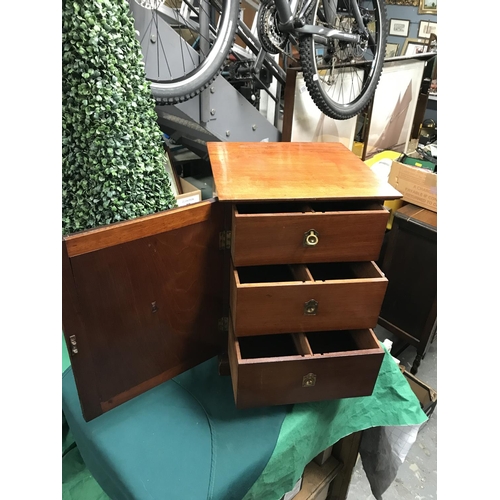 394 - VINTAGE WOODEN SMNALL CABINET WITH 3 DRAWERS AND RECESSED BRASS FITTINGS 30CMS W X 44CMS H