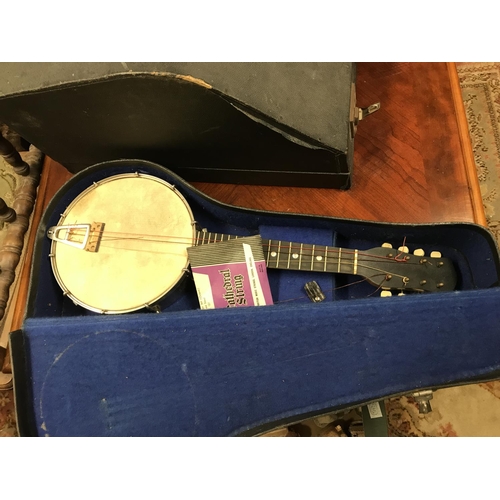 869 - CASED VINTAGE BANJO