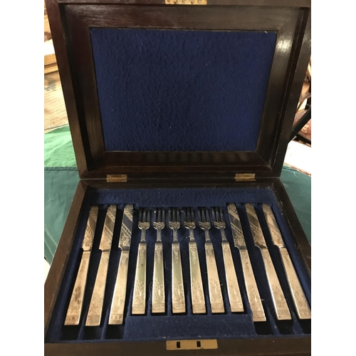 494 - BOX OF ORNATE CUTLERY - BOX DATED 1869