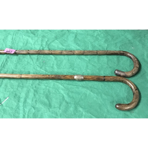 82 - 2 X WALKING CANES WITH SILVER COLLARS