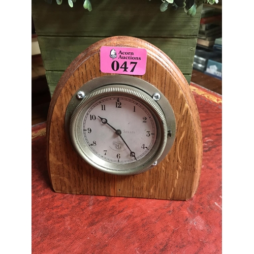 47 - VINTAGE SMITHS MORRIS MINOR CAR CLOCK MOUNTED IN A WOODEN SURROUND - CLOCKS AND WATCHES ARE NOT TEST... 