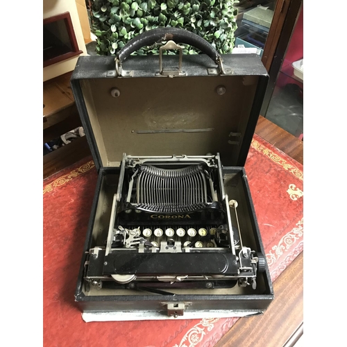 91 - VINTAGE CASED CORONA FOLDING TRAVEL TYPEWRITER