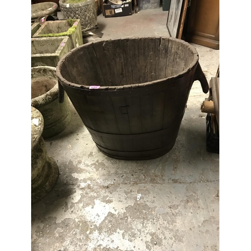 10 - LARGE WOODEN PLANTER/BARREL - 50CMS H X 64CMS W X 46 CMS ACROSS - COLLECTION ONLY OR ARRANGE OWN COU... 