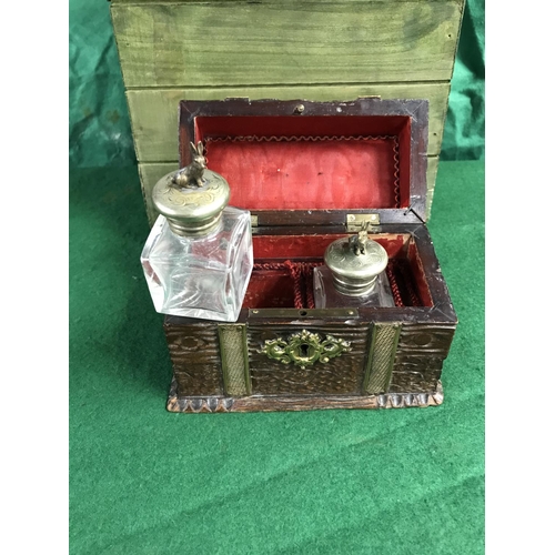 37 - BEAUTIFUL WOODEN CASKET WITH BRASS STRAPS WITH 2 X TRAVEL BOTTLES WITH RABBIT FINIALS TO EACH BOTTLE... 