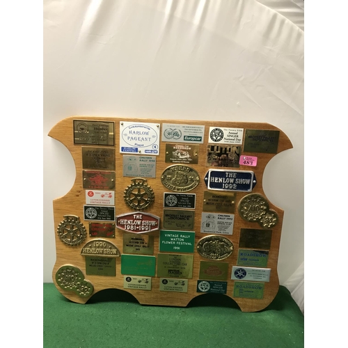 483 - DISPLAY BOARD OF CAR RALLY BADGES / PLAQUES - 56CMS X 48CMS